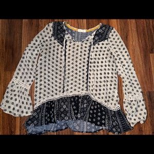 Navy and black boho, flowy blouse. In great condition, only worn a couple times.